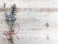 Dried lavander bouquet on a wooden surface