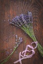 Dried lavender on a dark wooden table, shot from above