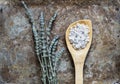 Dried lavender flatlay on rustic background with bathsalt in a spoon