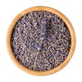 Dried lavender flowers in wooden bowl isolated on white. Top view Royalty Free Stock Photo