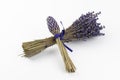 Dried lavender (Lavandula) flowers and handmade lavender wand isolated on white background Royalty Free Stock Photo