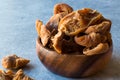 Dried Leaf Apricots in wooden Bowl / Yaprak Kayisi Royalty Free Stock Photo