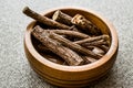 Dried Licorice Sticks in wooden bowl / Meyan Koku