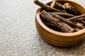 Dried Licorice Sticks in wooden bowl / Meyan Koku