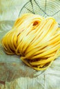 Dried linguine Italian pasta in a country kitchen