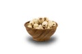 Dried Lotus Seeds in wooden bowl on white background Royalty Free Stock Photo