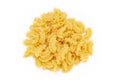 Dried macaroni cockerel scallops. Heap of pasta on white background