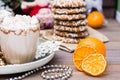 Dried Mandarin Slices, Hot Cocoa With Marshmallows And Christmas Cookies In Christmas Decorations