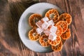 Dried mandarin or tangerine slices with mandarin flavored Turkish delight on a wooden table. Seferihisar local flavors. Dried