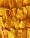Dried mango slices close-up on white. Royalty Free Stock Photo