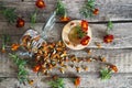 Dried marigold flowers with medicinal herbal tea on a wooden background. The use of flowers Chernobrovtsy or Mary is Gold in folk Royalty Free Stock Photo