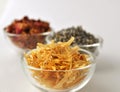 Dried marigold petals in a clear glass bowl Royalty Free Stock Photo