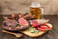 Dried meat beer set with red pepper Royalty Free Stock Photo