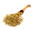 Dried Melilotus officinalis Yellow Sweet Clower on the wooden spoon isolated. Royalty Free Stock Photo