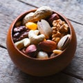 Mixed nuts in wooden bowl Royalty Free Stock Photo