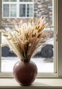 Dried natural pampas grass in a vase on the window