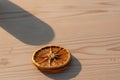 Dried Orange Slice On Wooden Table With Sunlight Royalty Free Stock Photo