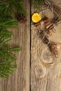 Dried orange slices, cinnamon sticks, branch of spruce