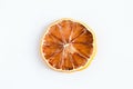 Dried orange slices on white background.