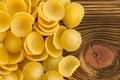 Dried orecchiette pasta on wood with copy space Royalty Free Stock Photo