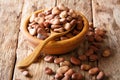 Dried organic healthy broad beans close-up in a wooden bowl. horizontal Royalty Free Stock Photo