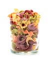 Dried pasta in cup front view. Colorful vegetable pastas on isolated background