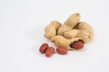 Dried peanuts close-up on a white background.