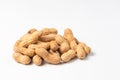 Dried peanuts in closeup isolated on white background Royalty Free Stock Photo