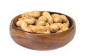Dried peanuts in wooden bowl isolated on white background Royalty Free Stock Photo