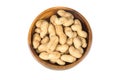 Dried peanuts in wooden bowl isolated on white background , top view Royalty Free Stock Photo