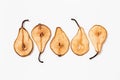 Dried pear slices on white background