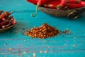 Dried pepper seeds and fresh chilli in background Royalty Free Stock Photo