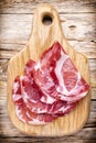 Dried pig meat slices. Delicatess. Royalty Free Stock Photo