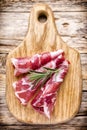 Dried pig meat slices. Delicatess. Royalty Free Stock Photo
