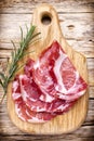 Dried pig meat slices. Delicatess. Royalty Free Stock Photo