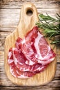Dried pig meat slices. Delicatess. Royalty Free Stock Photo