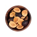 Dried plums in a brown wooden dish. Dried fruits Royalty Free Stock Photo