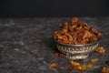 Dried raisins of grapes and dates in a medium-sized cup c. Royalty Free Stock Photo