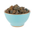 Dried raisins sultanas in a blue bowl Royalty Free Stock Photo