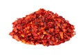 Dried red chili flakes with seeds, isolated on white background. Chopped chilli cayenne pepper. Spices and herbs. Royalty Free Stock Photo