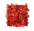 Dried red chili flakes with seeds, isolated on white background. Chopped chilli cayenne pepper. Spices and herbs. Top Royalty Free Stock Photo