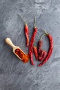 Dried red chili peppers and chili powder Royalty Free Stock Photo