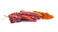 Dried red chili peppers and chili powder Royalty Free Stock Photo