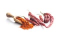 Dried red chili peppers and chili powder Royalty Free Stock Photo