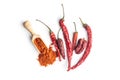 Dried red chili peppers and chili powder Royalty Free Stock Photo