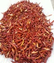 Dried red chilli on white background