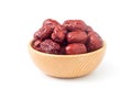 Dried red dates in a wooden bowl Royalty Free Stock Photo