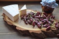 Dried red hot chilli peppers, very spicy on wooden table.