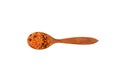 Dried Red Lentil and spices in wooden spoon isolated on white background. Masurdal or Dal. Mix of Uncooked ingredients for soup- Royalty Free Stock Photo