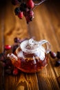 Dried red rose hips and tea Royalty Free Stock Photo